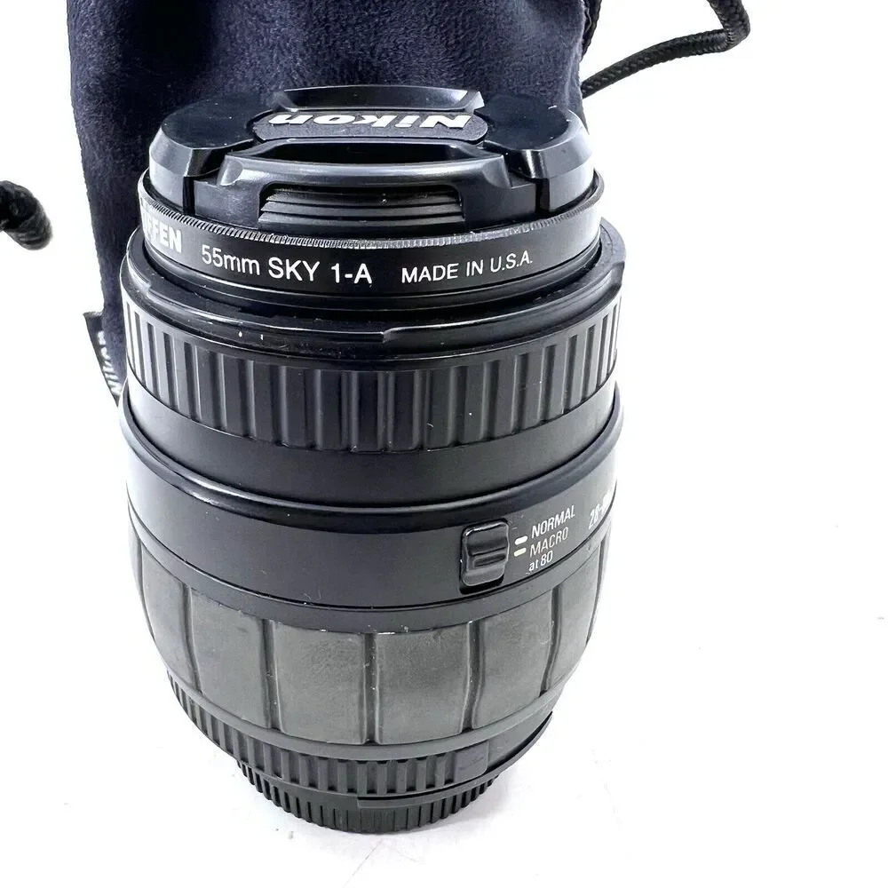 Sigma 28-80f/3.5-5.6 Aspherical Macro Lens w/a Tiffen Sky 1A Filter & Carry Bag